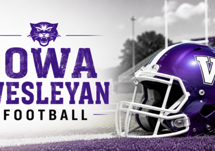 Purple football helmet representing Iowa Wesleyan football on a stadium field.