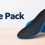 A pair of cushioned insoles representing a Sole Pack guide